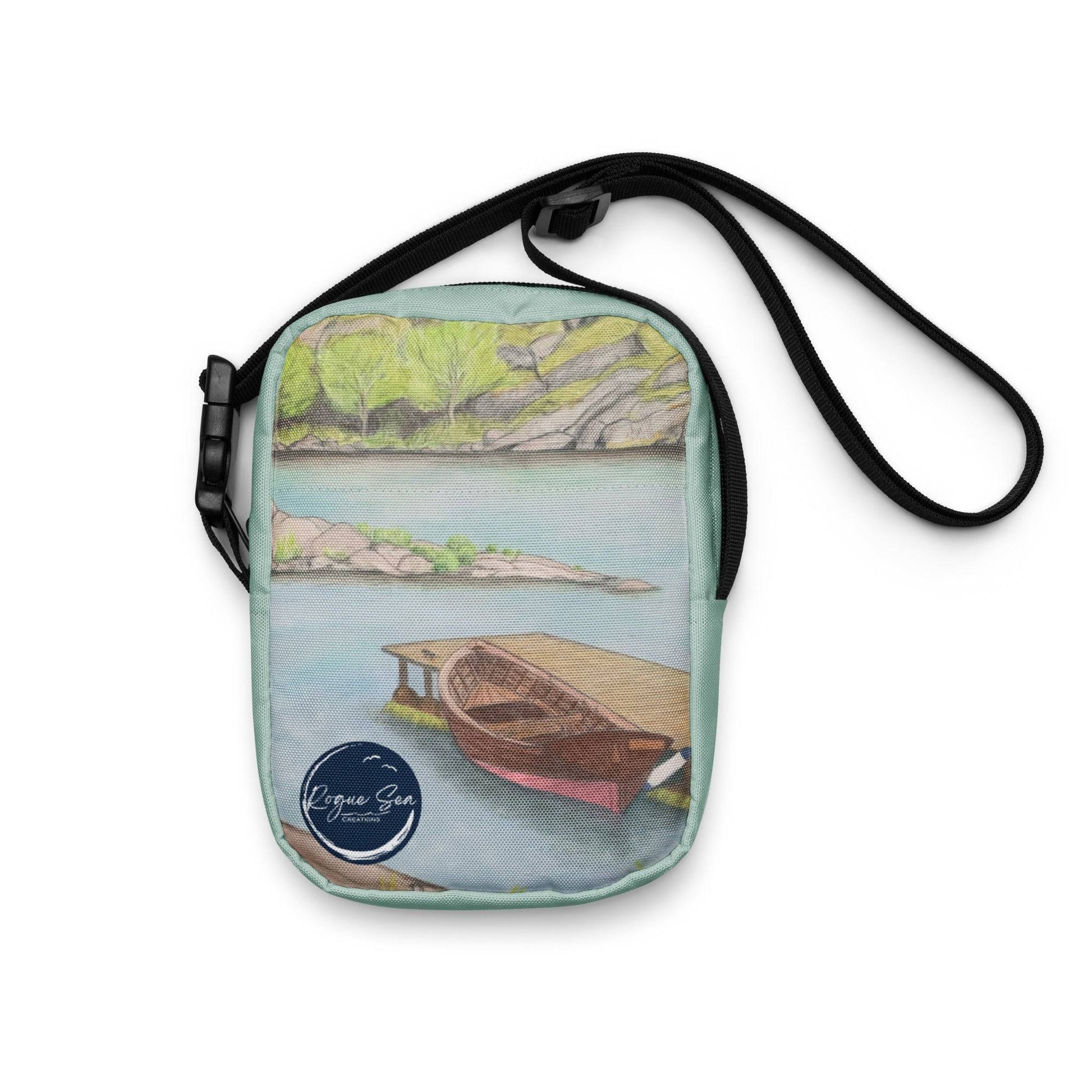 Wooden boat at the Dock crossbody bag artwork Rogue Sea Shop