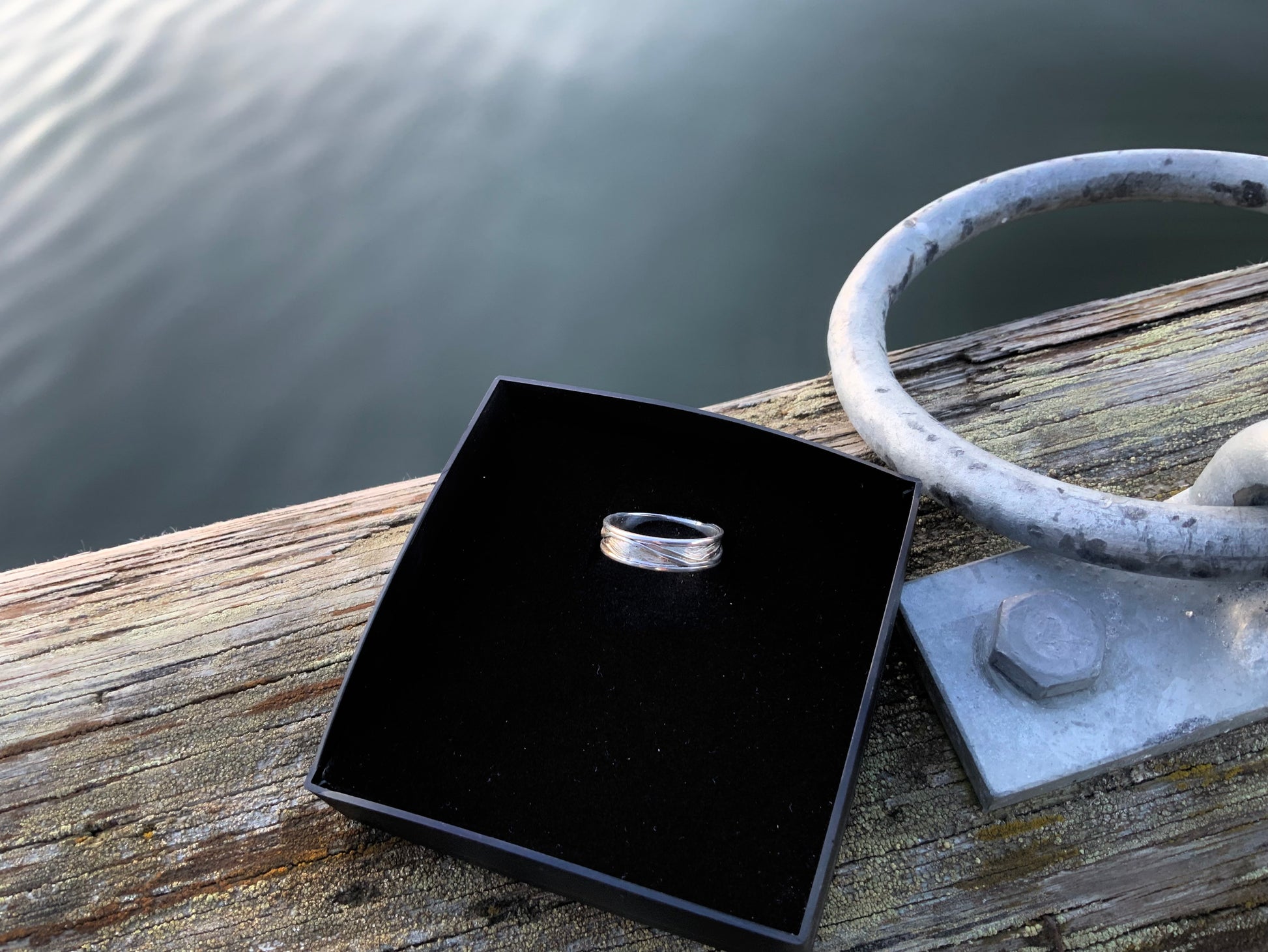 Nautical silver ring on Old pier