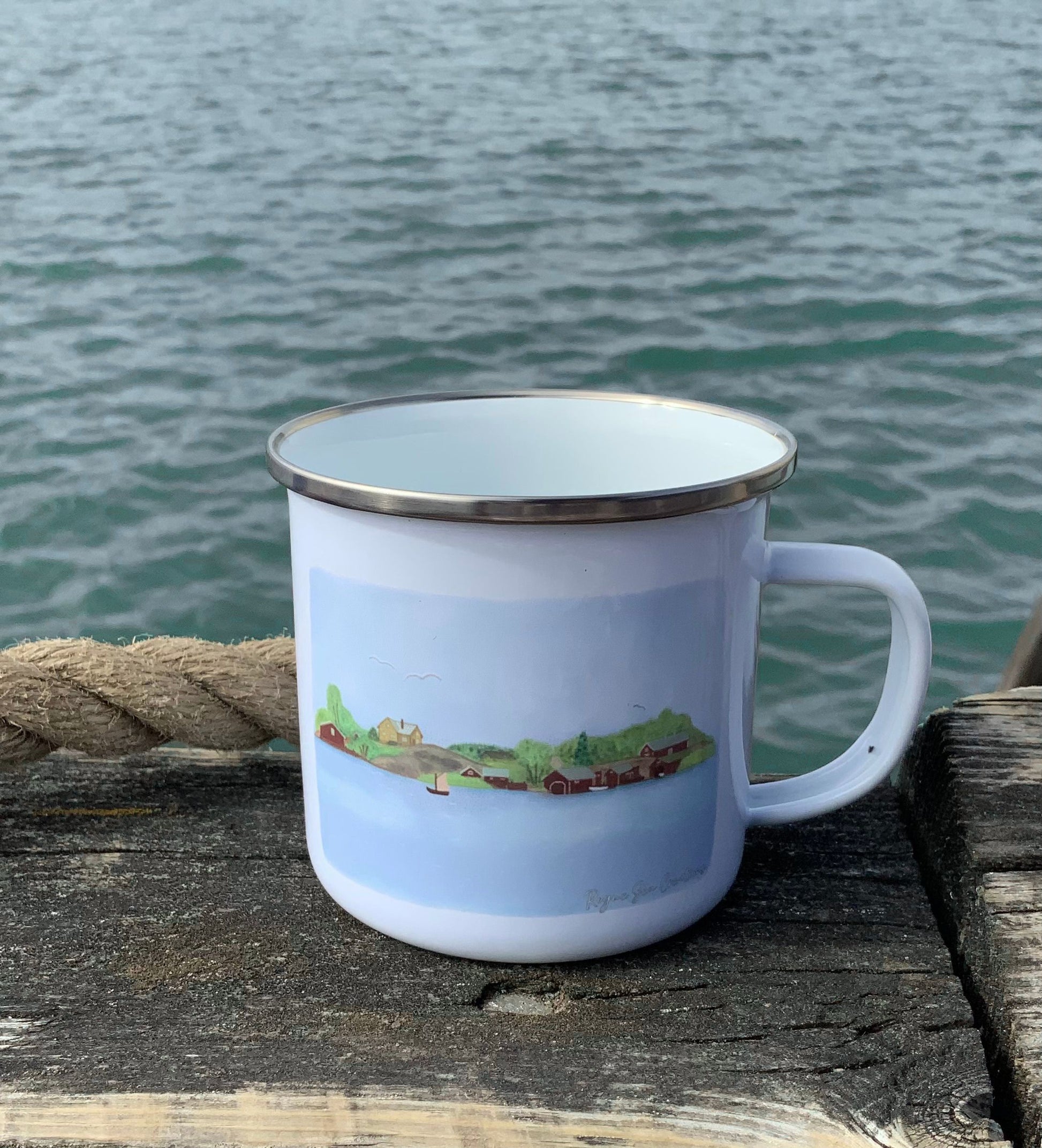 Archipelago Scenery mug on wooden pier against sea